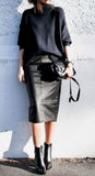Lara Bohinc black leather bag with gilt trim